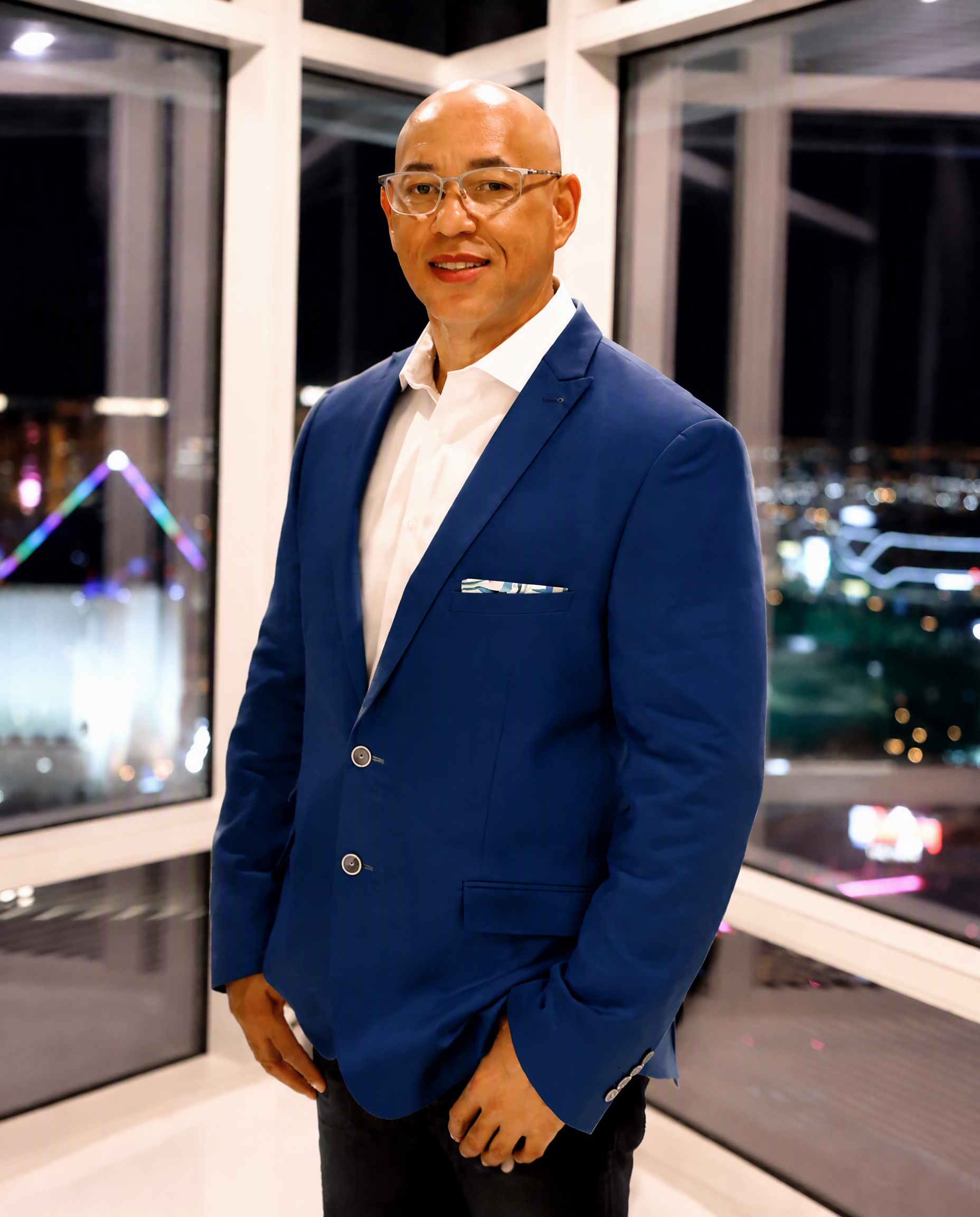 Gerald Lacey II, The Visionary, in a tailored sapphire blazer